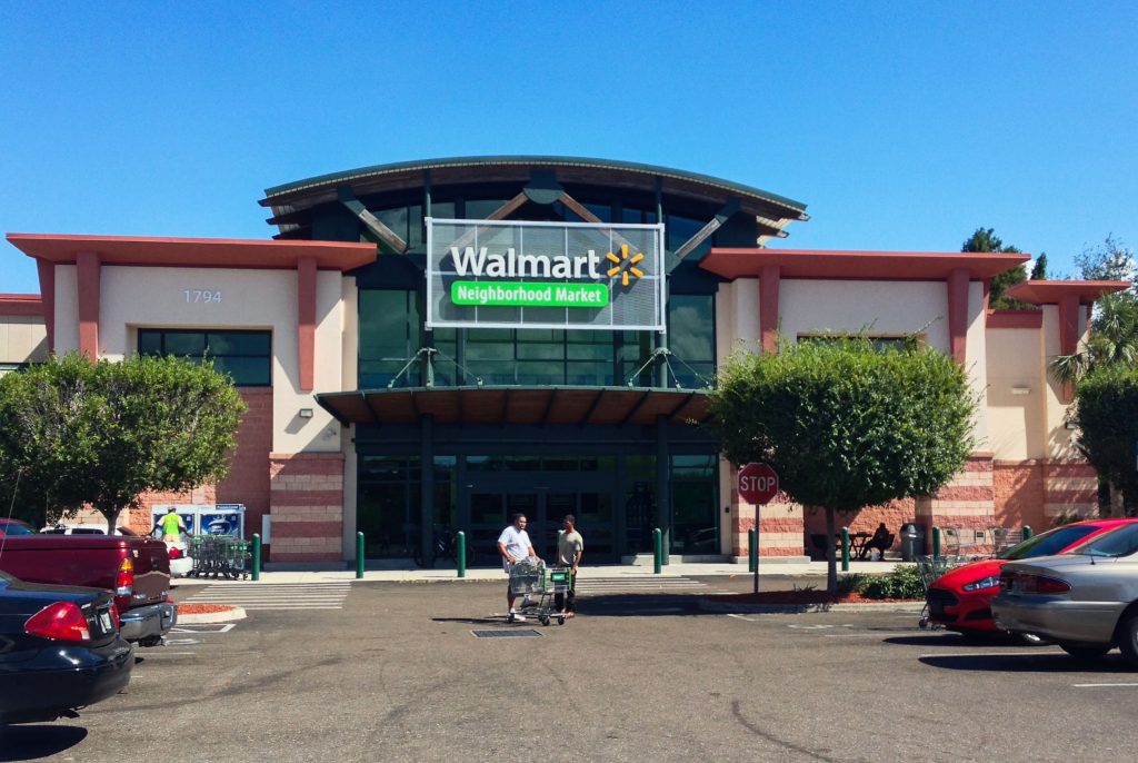 Shoppers outside of Walmart Neighborhood Market, Midtown Plaza - St. Petersburg, FL