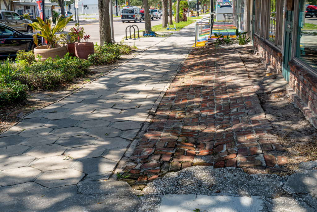 Frankenstein sidewalk on Central Avenue and 27th Street. Photo by Richard Boore.