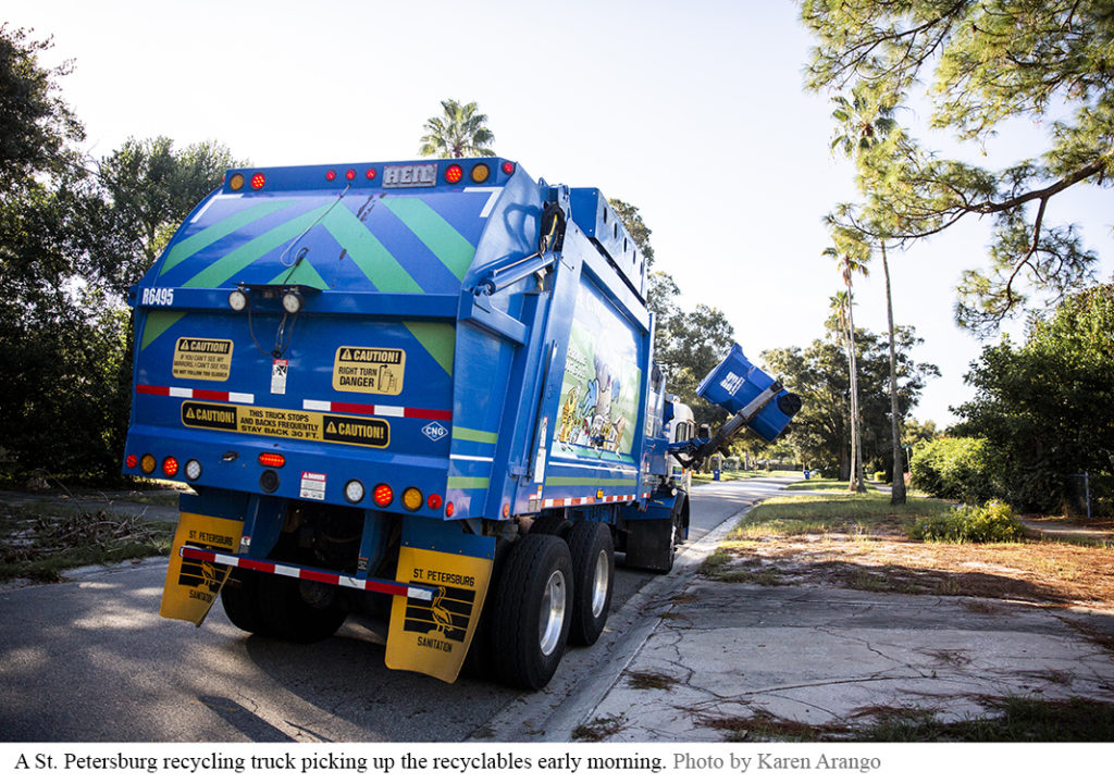 A St. Petersburg recycling truck picking up recyclables early morning. Photo by Karen Arango.